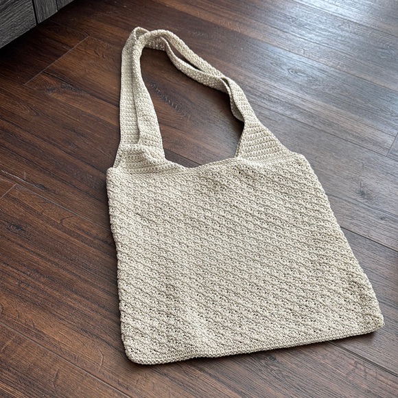 Handbags - Elegant Cream Knit Tote Bag has pen marks on the inside otherwise great bag.